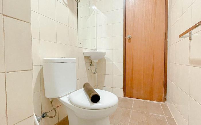 Simple Style 2BR Apt Vida View Makassar ByTravelio