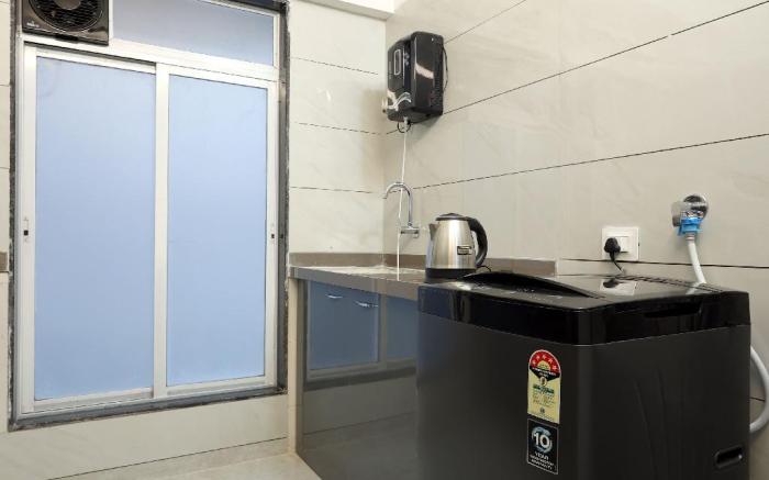 Mumbai 1BHK | Living Room + Kitchen | Near Airport