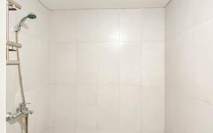 Soft Grey 1BR at Royal Sentul Park By Travelio