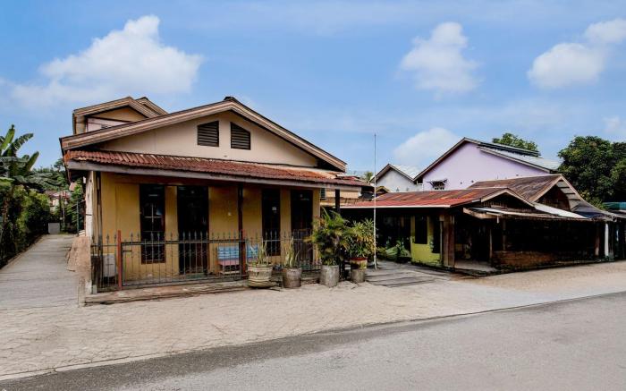 OYO 94775 Palm Cafe Inn