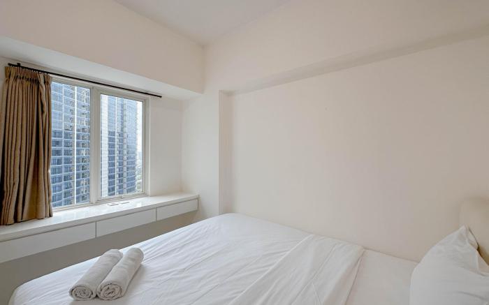 2BR near Pakuwon at Supermall Mansion By Travelio