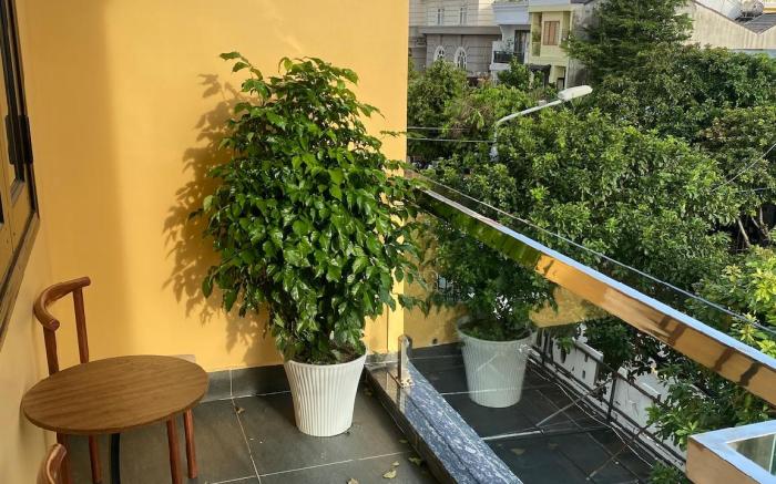 Balcony view room with vinyl record machine.