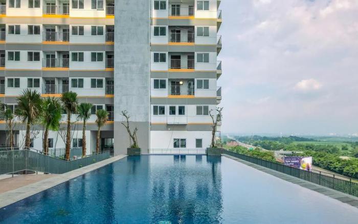 Cream Tone 1BR Royal Sentul Park Apt By Travelio
