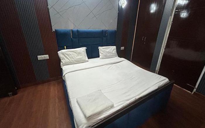 FabHotel Happy Residency