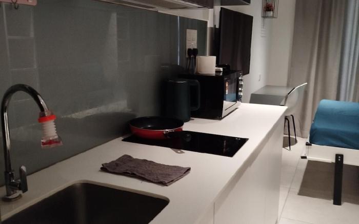 Lovely Queen Studio with Balcony by ComfyAsia