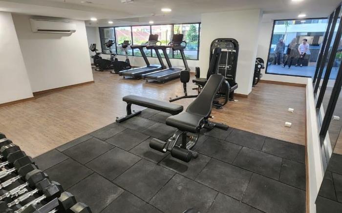 Simple Queen Studio with Balcony by ComfyAsia