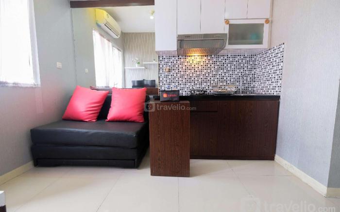 Homey 2BR Green Pramuka Apartment By Travelio