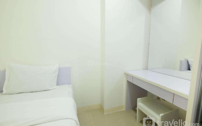 Simply Living 2BR at Bassura City Apt By Travelio