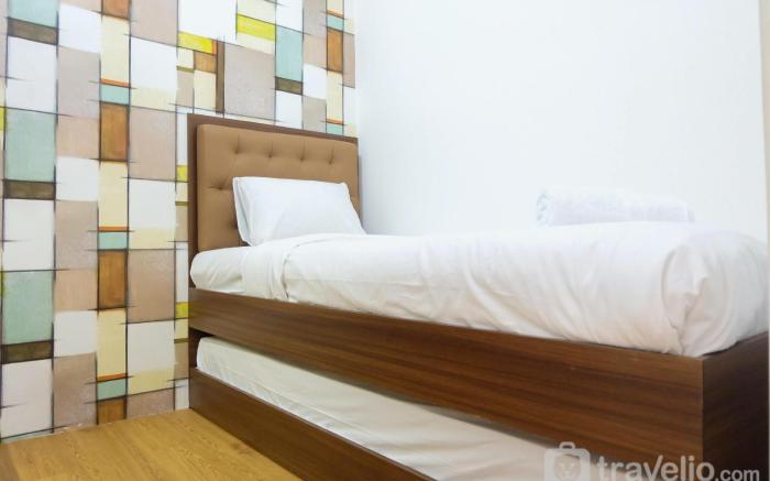 City View 2BR Apartment Bassura City By Travelio