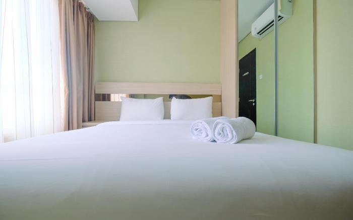 Comfy 2BR Apartment at Nifarro Park By Travelio
