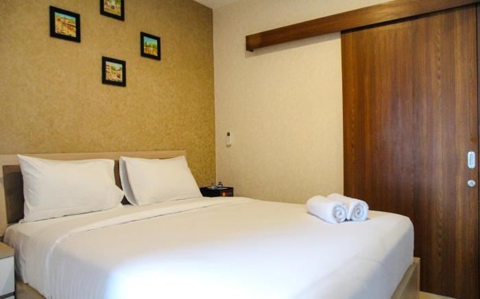 Minimalist 1BR Grand Kamala Lagoon Apt By Travelio