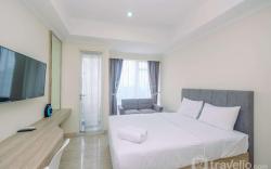 Warm Studio at Menteng Park Apartment By Travelio