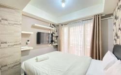 Studio Furnished at Grand Asia Afrika By Travelio
