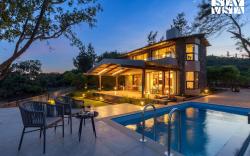 Dawn Ecstasy by StayVista - Hill-view villa with Modern interiors, Garden area & Indoor games