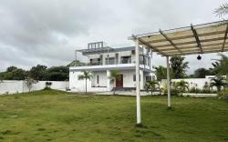 NMR Nest Farms Poolside Getaway –3BHK by homeyhuts
