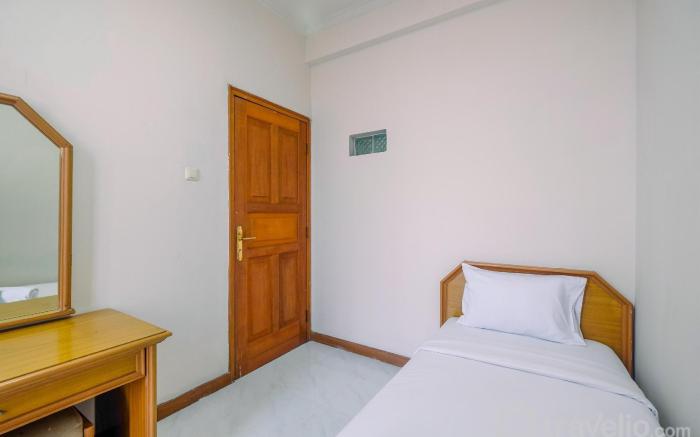 Strategic 3BR Kondominium Juanda Apt By Travelio