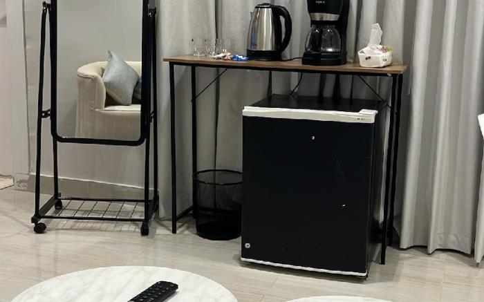 Quiet studio with master bed and side seat