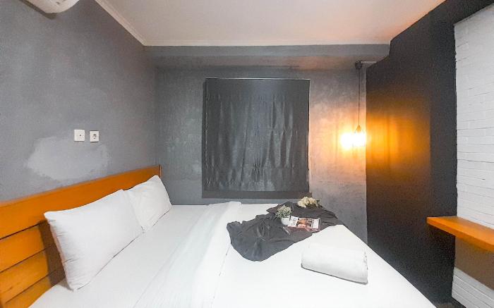 Industrial Look 2BR at Gateway Pasteur By Travelio