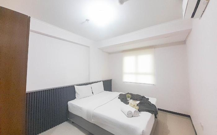 Grey Nest 2BR at Gateway Pasteur Apt By Travelio