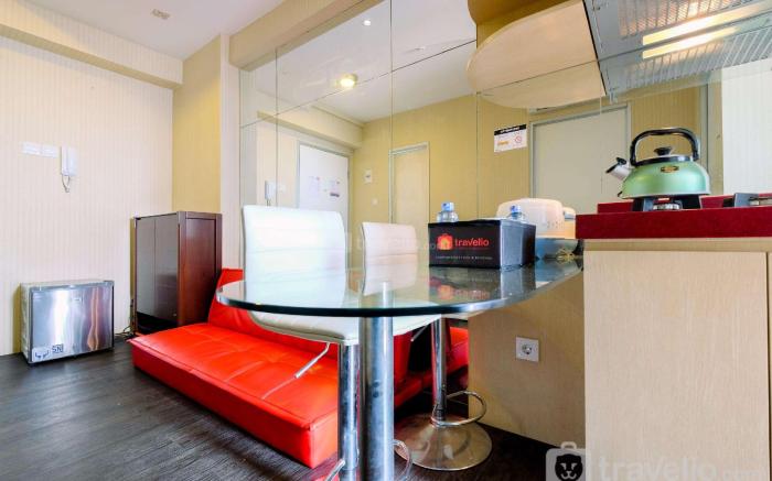 Homey 2BR at Green Bay Pluit Apartment By Travelio