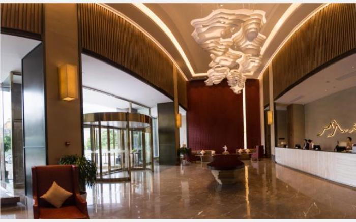 Echeng Hotel Laibing Jinxiu Shuidian Tower