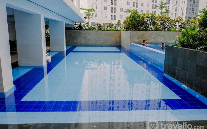 Furnished Minimalist 2BR Bassura City By Travelio