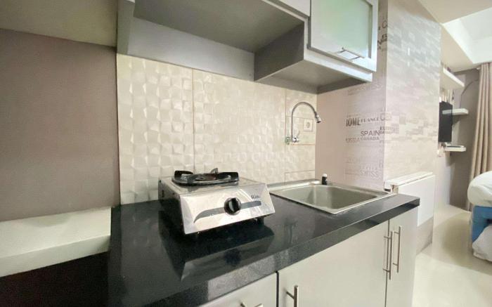 Studio Furnished at Grand Asia Afrika By Travelio