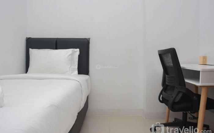 Cozy Style 2BR Green Pramuka City Apt By Travelio