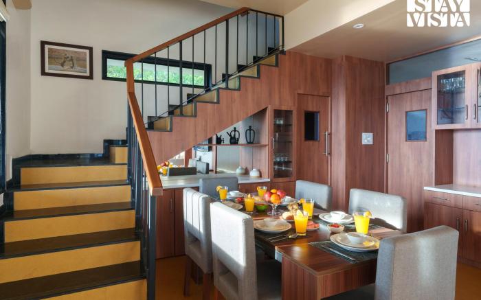 Dawn Ecstasy by StayVista - Hill-view villa with Modern interiors, Garden area & Indoor games