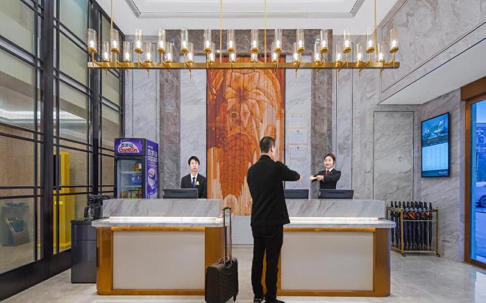 Vienna Hotel Qianjiang High Speed Railway Longxia City