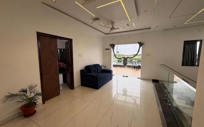 NMR Nest Farms Poolside Getaway –3BHK by homeyhuts