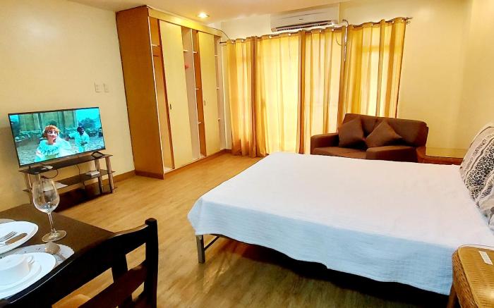 Studio-type condo unit with common pool