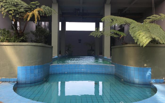 Studio Furnished at Grand Asia Afrika By Travelio