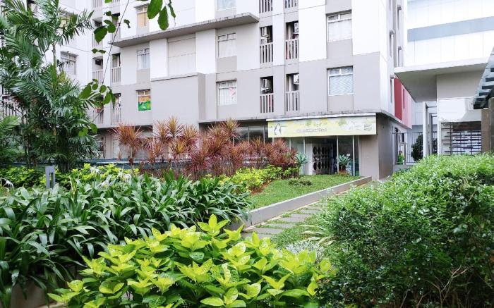 Warm Homey 2BR at Green Bay Pluit Apt By Travelio