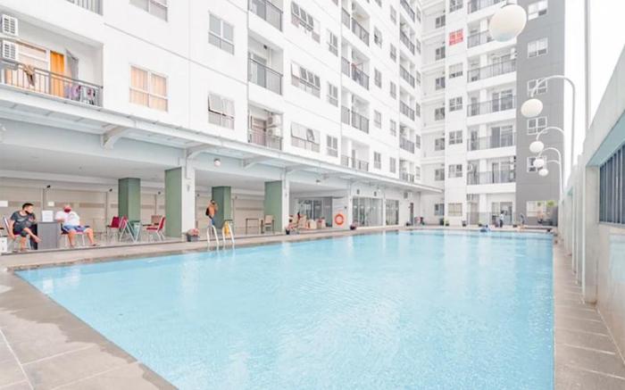 Modern Serenity 2BR Mekarwangi Square By Travelio