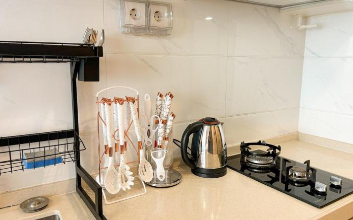 Kalmara Studio Room @ Sky House BSD