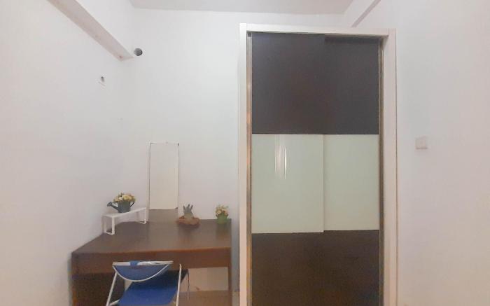 1BR near Station @ Tamansari Panoramic By Travelio