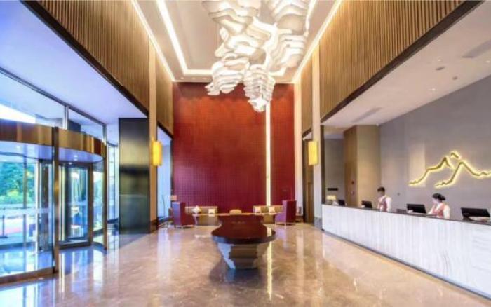 Echeng Hotel Laibing Jinxiu Shuidian Tower