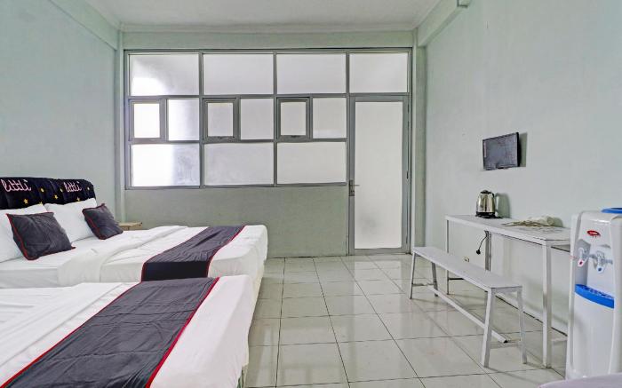 Capital O 91466 Hotel Neu Backpacker Tf Syariah (smk Tb)