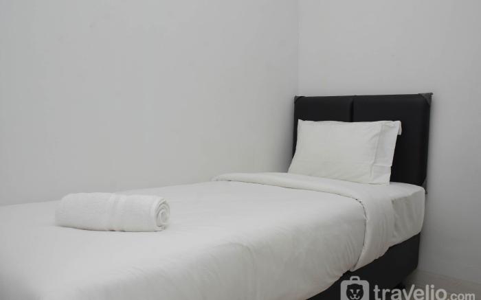Cozy Style 2BR Green Pramuka City Apt By Travelio
