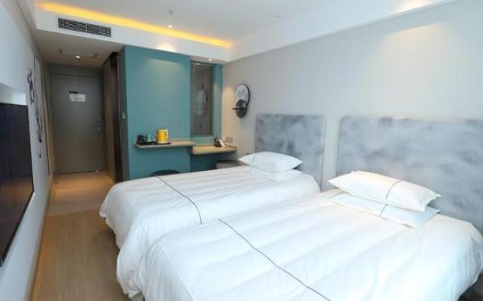 Magnotel Hotel Dalian Wafangdian Railway Station Business Center