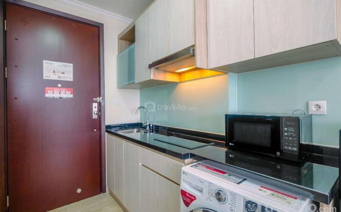 Warm Studio at Menteng Park Apartment By Travelio
