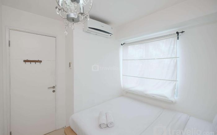 Warm and Cozy 2BR at Bassura City Apt By Travelio