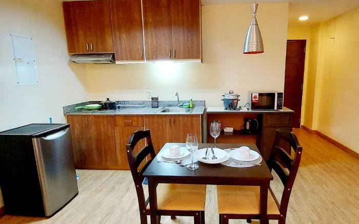 Studio-type condo unit with common pool