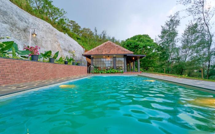 Pine Malhar Pool  Resort by VOYEHOMES
