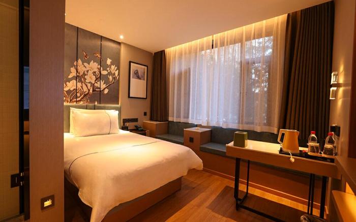Magnotel Jinzhou Shifu Avenue Red Star Macalline Wanda Plaza