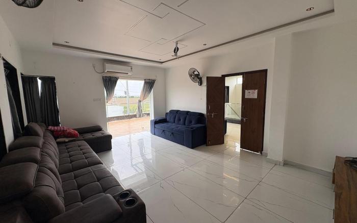 NMR Nest Farms Poolside Getaway –3BHK by homeyhuts