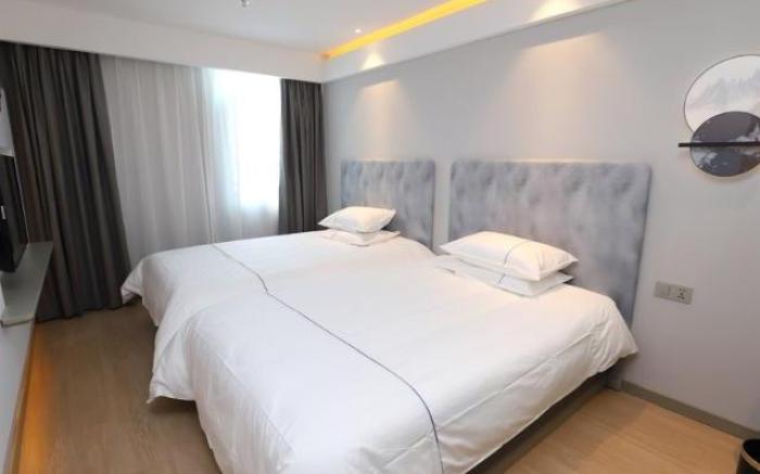 Magnotel Hotel Dalian Wafangdian Railway Station Business Center